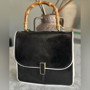 Black Crossbody Purse With Bamboo Top Handle, White Accents, & Gold Hardware